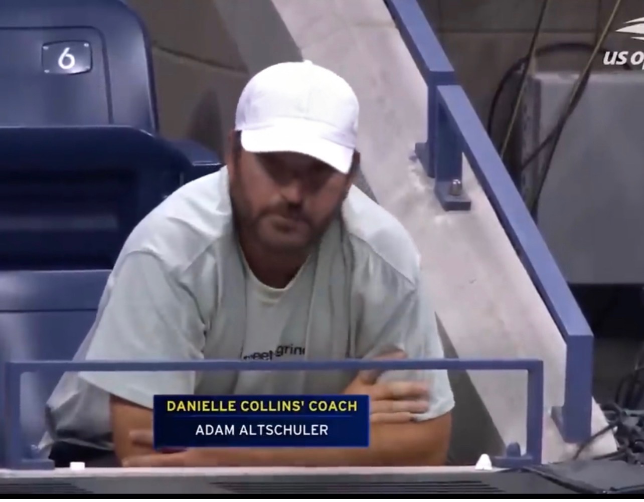 Adam Altschuler watching from the coach's box at the US Open